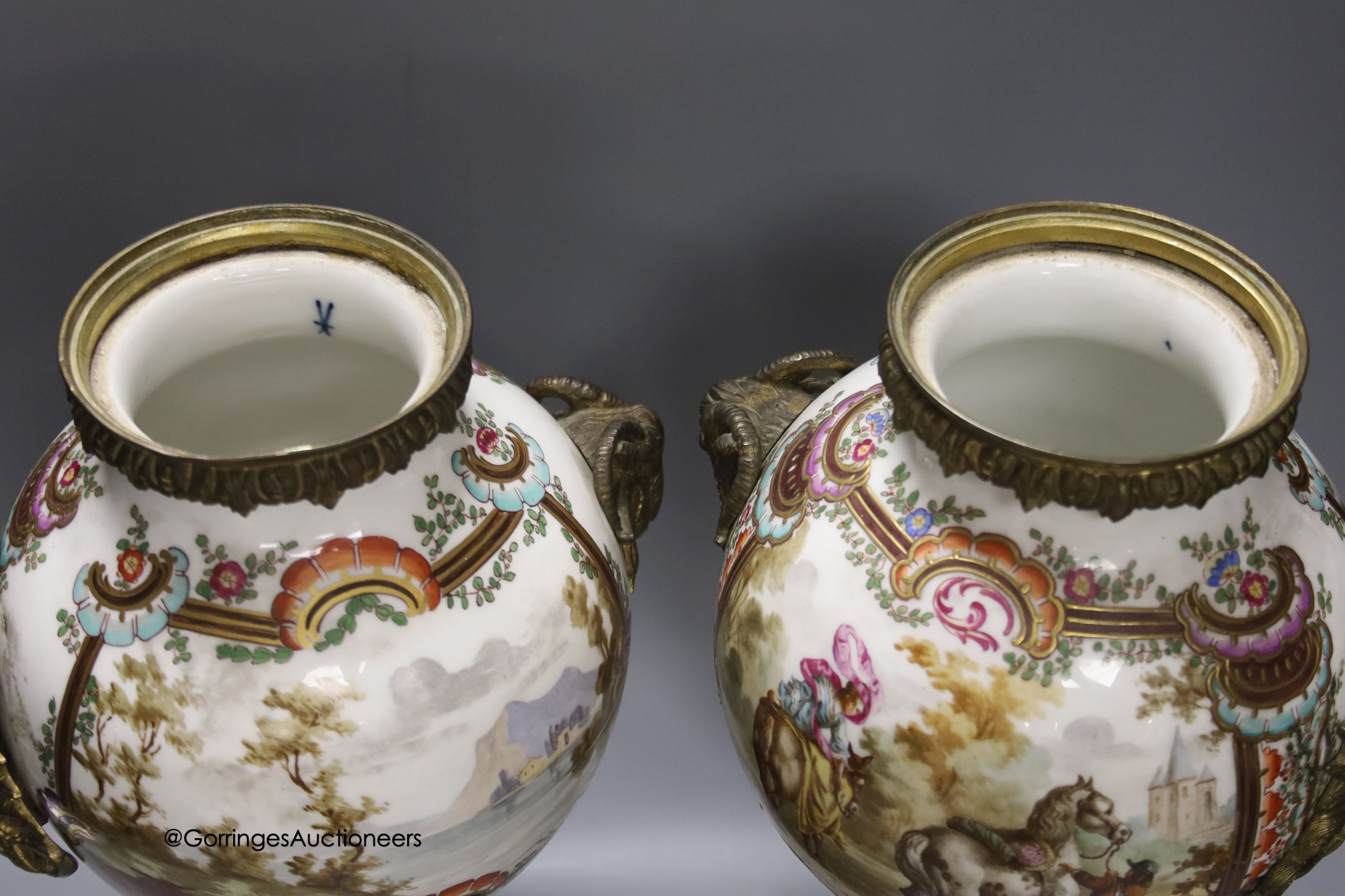 A pair of 19th century German ormolu mounted porcelain jars and covers, 41cm